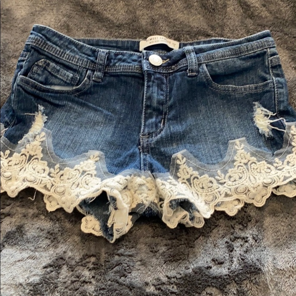 Mid rise lace bottom shorts